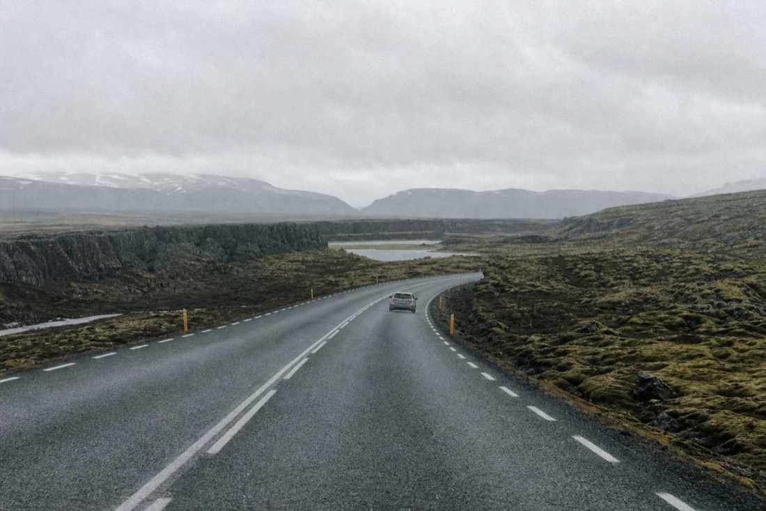 Empty stretch of Route 36 crossing the lava plain toward Þingvellir